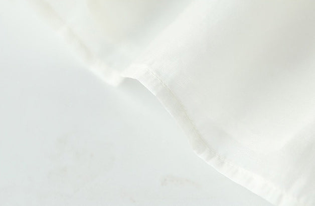 圓領荷葉邊蛋糕拼接洋裝